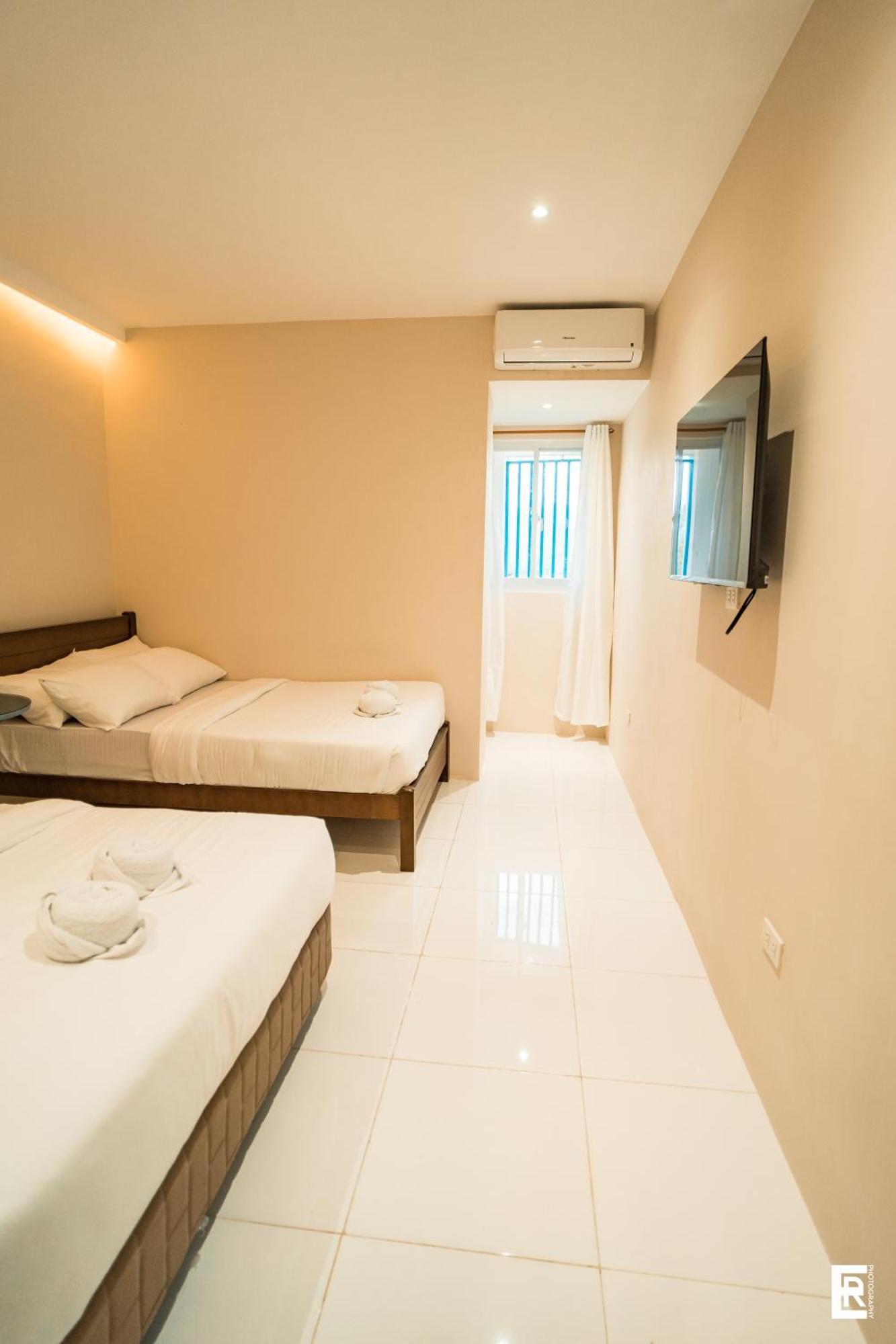Bernese Resort Hotel Powered By Cocotel Ligao Habitación foto